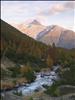 The Susauna Valley (S-chanf) with autumn larches and the river Vallember